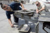 Staff Sgt. Nicholas, right, aerospace ground equipment assistant floor lead, and Senior Airman Michael, AGE journeyman, inspect an MJ-1B Jammer for an oil leak Mar. 3, 2015, in Southwest Asia. The AGE flight is responsible for 542 pieces of equipment and averages 4,800 equipment dispatches, 250 maintenance actions and 110 periodic and phase inspections every month. Nicholas is currently deployed from Seymour Johnson Air Force Base, N.C., and is a native of Geraldine, Ala. Michael is currently deployed from Hill Air Force Base, Utah, and is a native of Burleson, Texas. (U.S. Air Force photo/Tech. Sgt. Marie Brown)