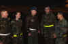 Col. Richard T. Devereaux, 100th Air Refueling Wing commander, and Maj. Mark Kerr,  100th Logistics Readiness Squadron deputy commander, speak with 100th Maintenance Squadron troops who supported President Bushs visit to Europe Feb. 20 to 24, (TSgt Becker and Airman 1st Class Rebecca Bowen, left, RAF Mildenhall AGE) and Tech. Sgt. Roger Naranjo, right.