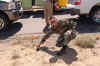 TSgt Shawn Hendricks, AFOTEC, working outside of AGE; building an IED for Test and  Evaluation